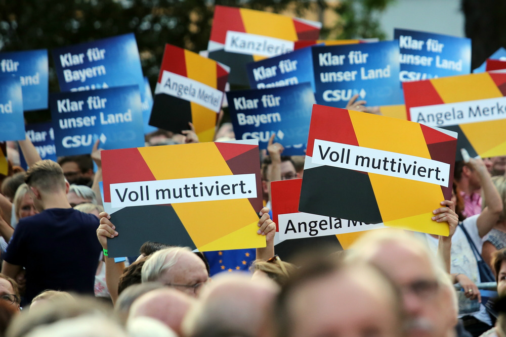 30th August, 2017 Erlangen, Germany A crowd of CSU and CDU supporters listen to Angela Merkel speaking in the run up to the German general election